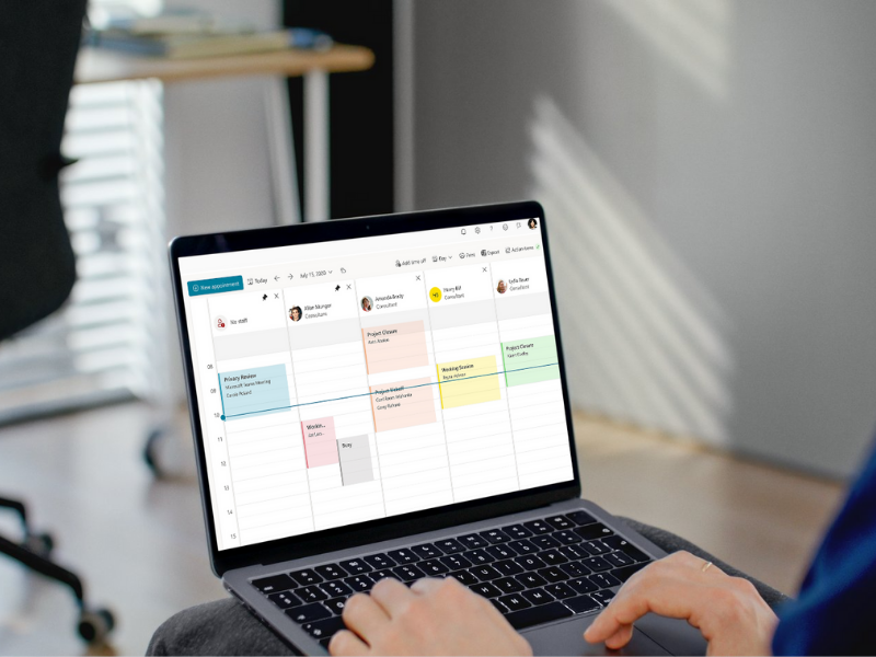 Open Laptop showing Microsoft Bookings Calendar